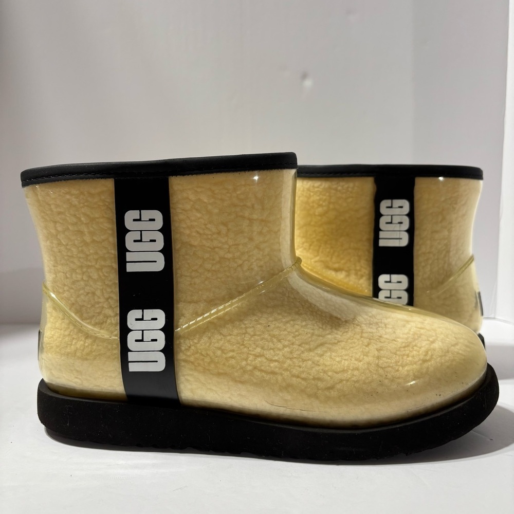 UGG WOMEN'S CLASSIC CLEAR MINI NATURAL‎ BLACK BOOT FAUX FUR
WOOL LINED SIZE 5